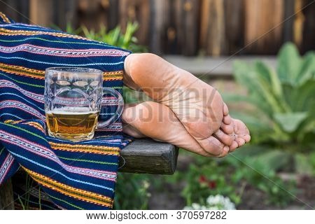 Glass Of Light Beer And Woman Bare Feet, Ligo