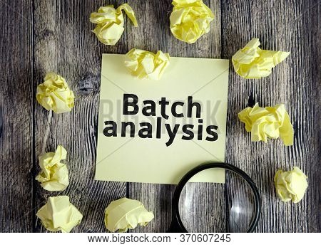 Batch Analysis Seo Concept - Text On Yellow Note Sheets On A Dark Wooden Background With Crumpled Sh
