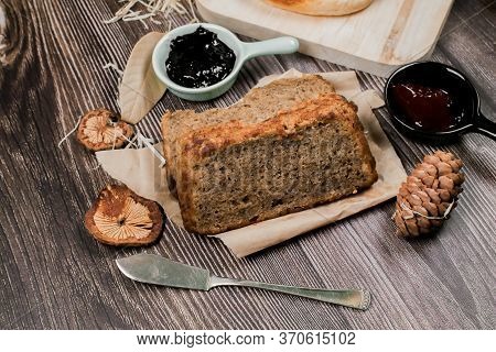 Close Up Homemade Delicious Freshly Baked Classic Sweet Banana Bread Sliced With Blueberry/strawberr