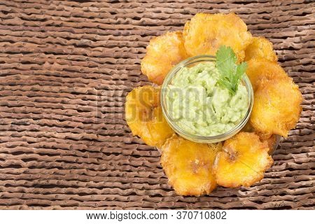 Patacón Fried Flattened Pieces Of Green Plantain (tostón, Tachino)