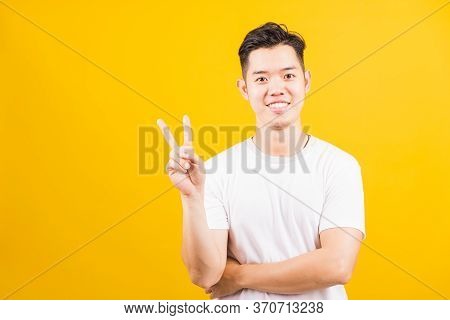 Portrait Happy Asian Handsome Young Man Smiling Standing Wearing White T-shirt He Showing Fingers Do