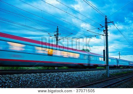 a passenger train travels through the night. night train with people of Ã?Ã?Ã?ÃÂ¶bb
