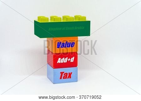 Conceptual Of Value-added Tax Roll-out In Saudi Arabia. Stacked Colorful Plastic Bricks With Texts V