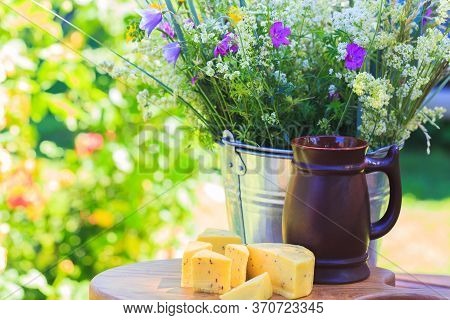 Bouquet Of Wild Summer Flowers, Traditional Latvian Events Ligo. Composition With Beer And Cheese