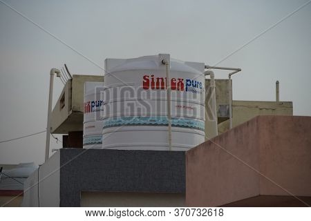 Twin White Sintex Water Tank On The Roof Of A House Or Industrial Building On Roof Top Or Deck. : Ud