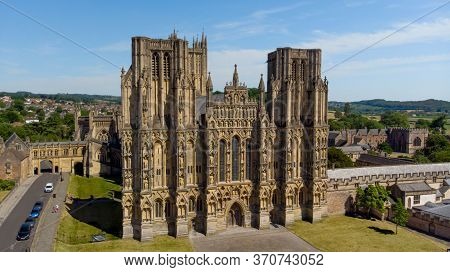 Wells, Somerset Uk - June 2020: Aerial View Of Wells Cathedral And The Surrounding Fields In Somerse