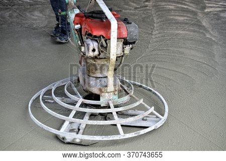 Helicopter Concrete Finishing Pouring Cement On Worksite