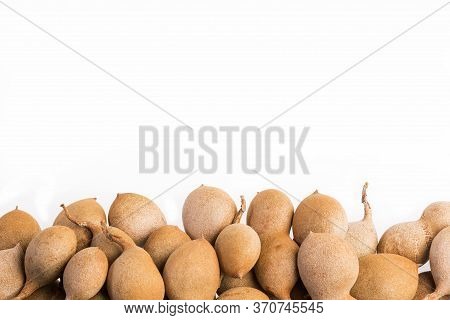 Tamarind Tropical Fruit - Tamarindus Indica. White Background
