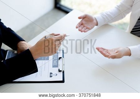 Business People Hold Resume Documents, Interviews For The Work Experience Of Young Men Applying As F