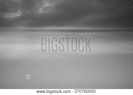 Bakio, Bizkaia/basque Country; Jul. 01, 2018. Black And White Photograph Of A Plastic Cup That Will 