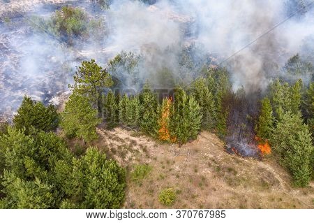 Aerial Drone View Of A Wildfire In Forested Area.