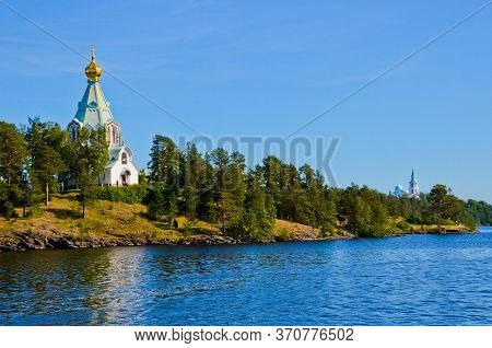 Nikolsky Skit On Valaam Island Seen From Ladoga Lake. Pilgrimage And Vacation Concept, Horizontal Ph
