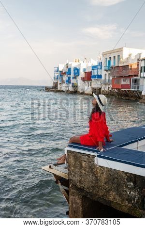 Mykonos Greece, Woman On Vacation At The Greek Island Mykonos, Girl In Dress At The White Streets Of