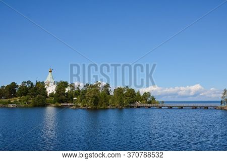 Nikolsky Skit On Valaam Island Seen From Ladoga Lake. Pilgrimage And Vacation Concept, Horizontal Ph