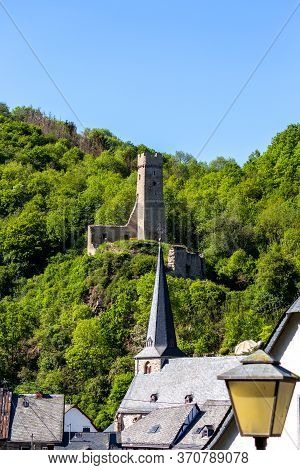 View At Church And Castle Ruin Loewenburg In Monreal, Eifel, Germany