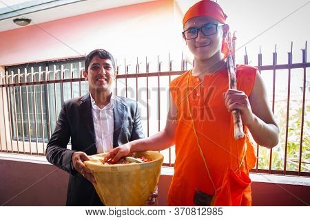 Kathmandu,nepal - June 11,2019: Hindu Holy Boy With His Maternal Uncle During Religious Ceremony Bra