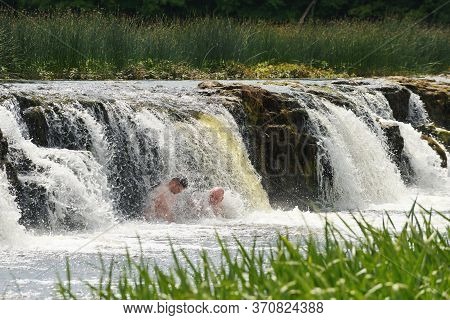 Kuldiga, June 03: Unidentified People Having Fun In The Venta River Water On June 03, 2020 At Kuldig