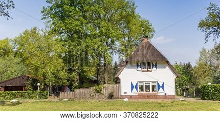 Rijssen, Netherlands - April 27, 2020: Little White House With Thatched Roof In Overijssel, Netherla