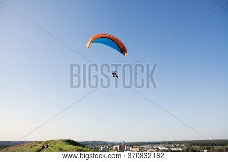 Glider Pilot Flying On Glider. Skydiving Flying. Parachute Extreme Sport