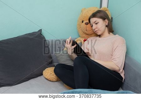 A Teenager With Her Beloved Plush Companion Tries To Study For The Matriculation Examination.