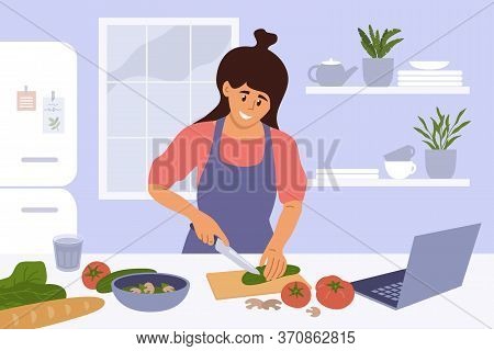 Cook Healthy Food At Home. Cute Girl Cooking Homemade Meals In Kitchen. Young Woman Watching Culinar