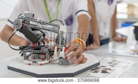 Robotic Lab Class With School Students Blur Background In Ai Learning Or Group Study Workshop In Sci