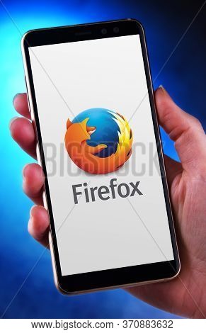 Poznan, Pol - May 21, 2020: Hand Holding Smartphone Displaying Logo Of Firefox, A Free And Open-sour