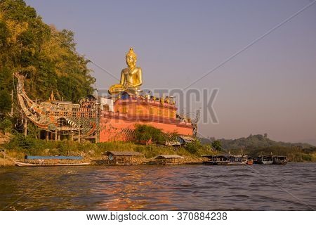The Giant Buddha On The Dragon Boat Temple At The Mekong River In The Town Of Sop Ruak In The Golden