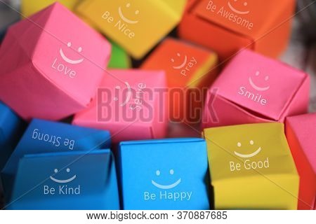 Colorful  Smiling Gift Boxes Background With Positive Motivational And Inspirational Single Words On