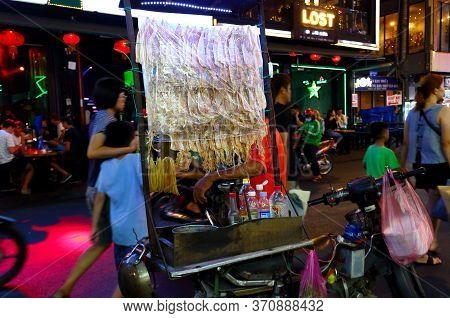 Ho Chi Minh City, Vietnam - March 27, 2019: Night Life And Local Cuisine On The Famous Road Bui Vien