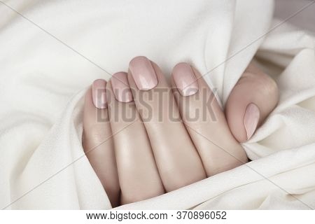 Female Hand With Manicure In Natural Color.