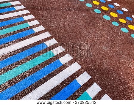 Rubber Coating Of The Playground, Colorful Bright Markings, The Concept Of Child Safety In The Playg