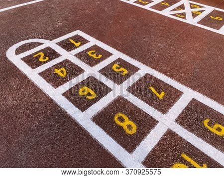 Rubber Coating Of The Playground, Colorful Bright Markings, The Concept Of Child Safety In The Playg