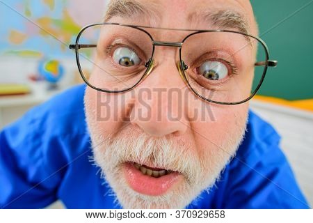 Surprised Teacher In Glasses. Teacher Or Professor Working In Classroom. Teachers Day. Teacher Prepa