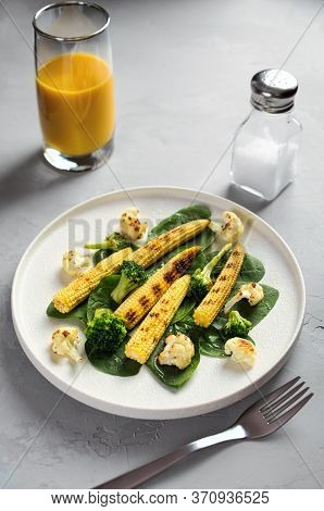 Grilled Vegetables And Juice On A Light Stone Background, Dietary Vegetarian Snack Babycorn, Healthy
