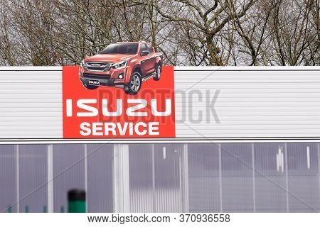 Bordeaux , Aquitaine / France - 02 21 2020 : Isuzu Service Pick Up Cross 4 Wheel Drive Car Sign Logo