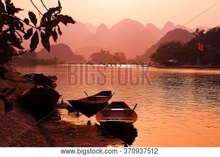 The Boats In The Yen River On The Way To The Perfume Pagoda Complex