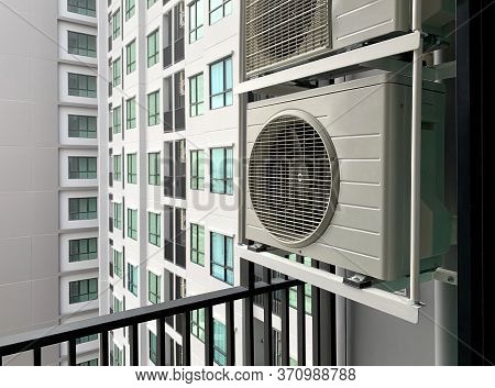 Air Compressor At Balcony Outside Condominium Area