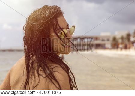 Young Woman With Sexy Smile Under The Tropical Sun Enjoying The Caribbean Sea On The White Sandy Bea
