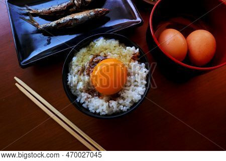 Tamago Kake Gohan Or Raw Egg On Rice. Traditional Food From Japan, Eat On Breakfast