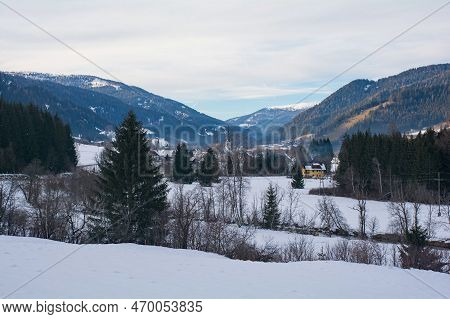 The Snowy December Landscape Near Gnesau In The Upper Gurk Valley In The Gurktal Alps, Carinthia, Au