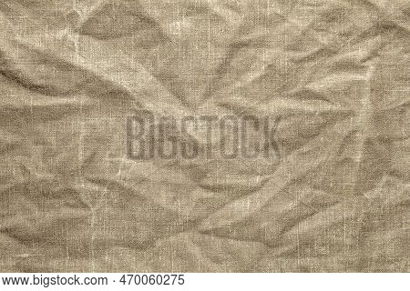 Texture From An Old Crumpled Green Tarpaulin With Traces Of Wear