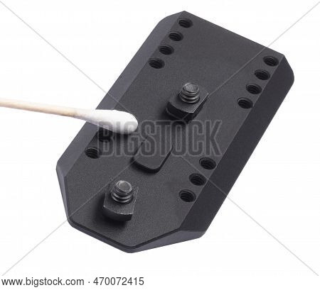 Cotton Swab Cleaning A Plate To Mount A Bipod On A Precision Rifle