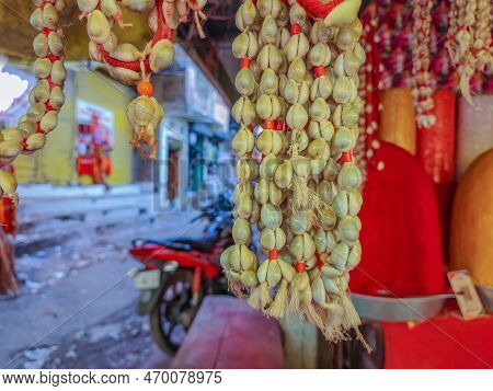 Stock Photo Of Traditional Cowry Shell Garland Or Kawdyachi Mala Hanging Outside Of The Shop For Sal