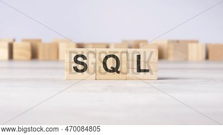 Sql - Word Concept Written On Wooden Cubes Or Blocks On A Light Background