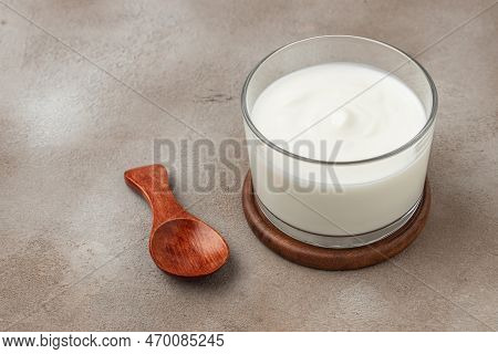 Homemade Yogurt, Kefir, Fermented Milk On A Light Background. Healthy, Clean Eating. Vegan Or Gluten