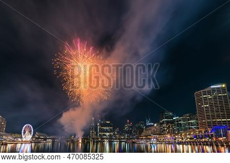 Sydney, Australia - April 16, 2022: Fireworks Display Above Darling Harbour Viewed Towards King Stre