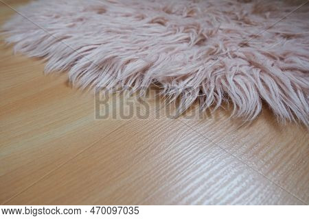 Long Pile Rug In Pink On A Beige Laminate Floor. Feminine Interior For A Room Or Bedroom Of A Girl O