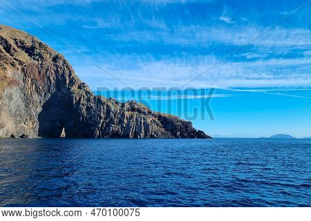Small Islands In The Ocean Or Sea. Volcanic Rocks