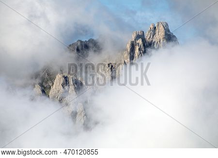 Dolomites Mountains In The Middle Of Clouds, Carnian Alps Mountains, Italy